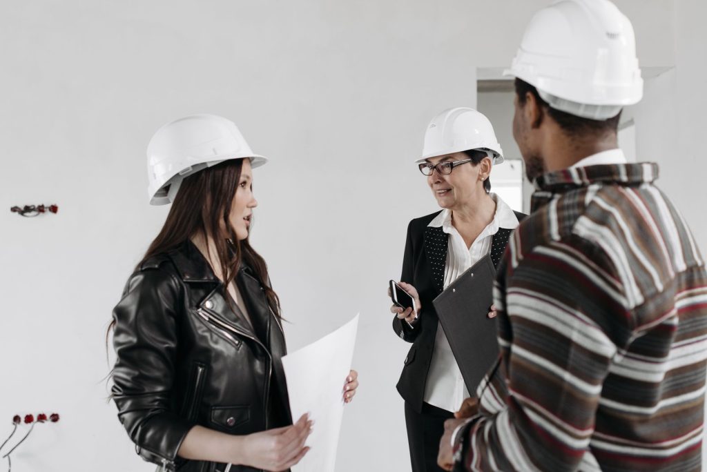 HVAC controls procurement team reviewing plans